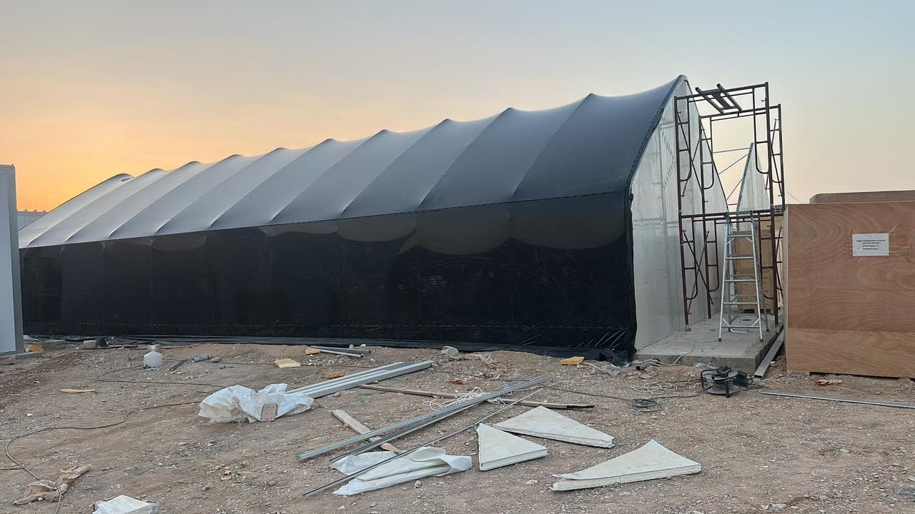 Tensile-canopy warehouse structure